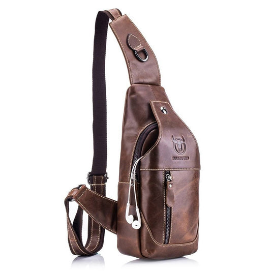 Brown leather sling bag with a strap on